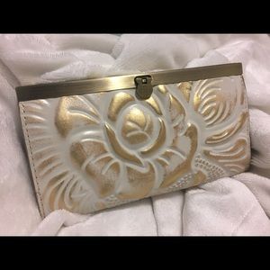 Patricia Nash metallic gold wallet.